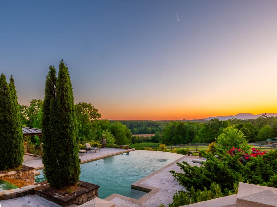 Twilight over the infinity pool and the Blue Ridge