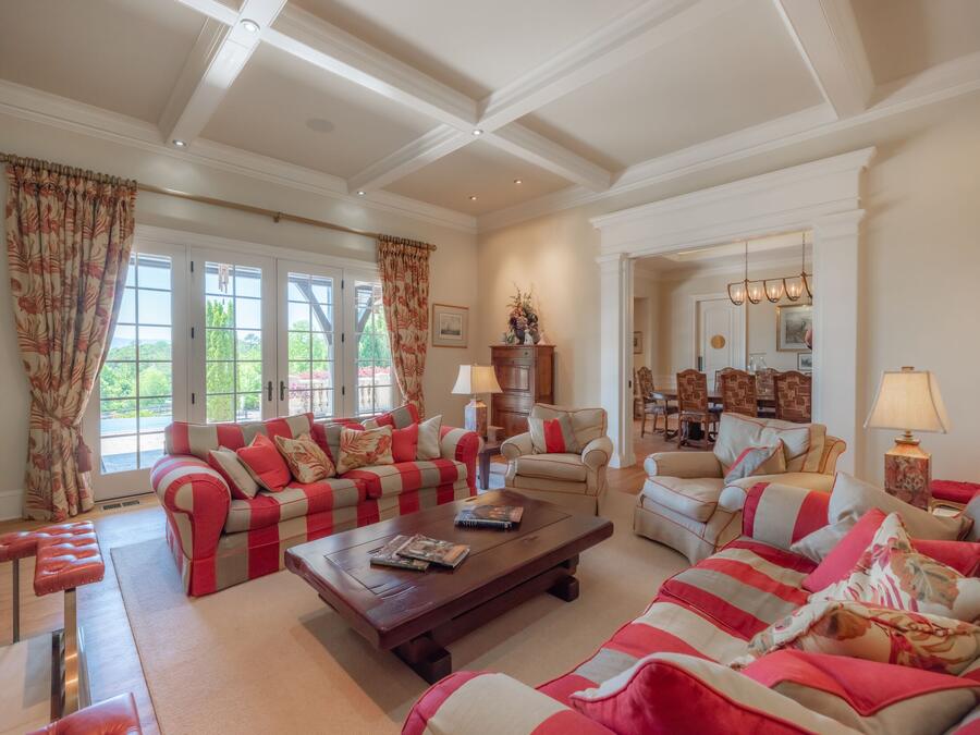 Living room under a coffered ceiling